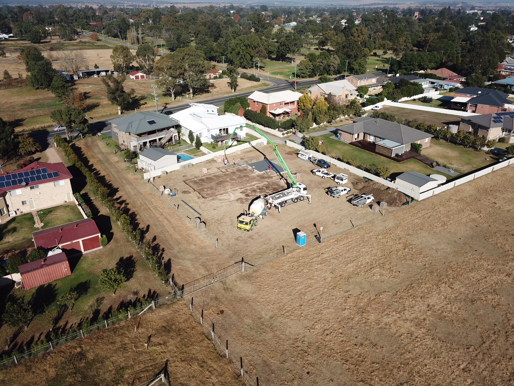 Aerial Shot Of Concrete And Pump For Footings